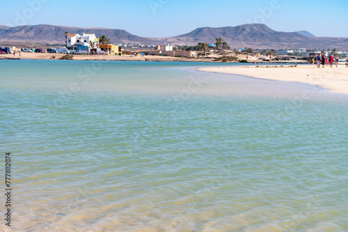 West coast of Fuerteventura island. Winter sea and sun vacation in El Cotillo touristic village, Canary islands, Spain. White sandy beach La Concha.. © barmalini