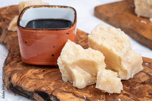 Tasting of 24 and 48 months aged Italian parmesan hard cheese from Parmigiano-Reggiano, Italy and balsamico vinegar from Modena