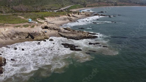 Aerial tracking along Leo Carillo state beach, Malibu, California photo