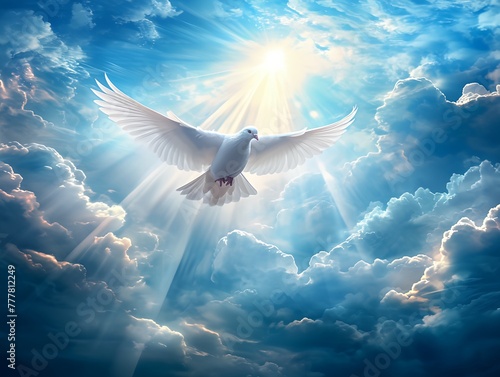 Holy Spirit dove is flying in clear blue sky, beautiful sun rays shine around. © inspiretta