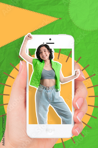 Young girl on a colorful background dances happily and over exits a cell phone held by a hand.