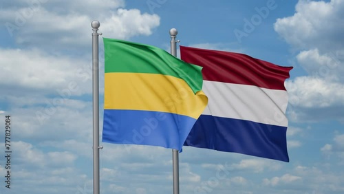 Netherlands and Gabon two flags waving together, looped video, two country relations concept photo