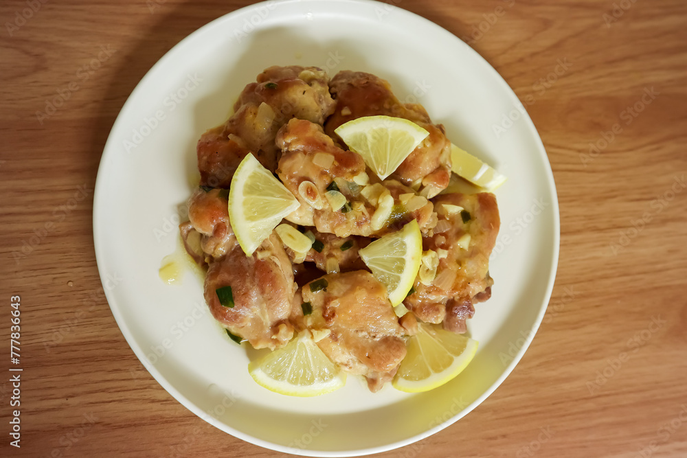 Lemon butter chicken served on plate, ready to eat