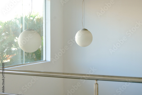 modern living room, design of modern , modern lamp on the wall, white wall lamp in the interior, white wall, white wall lamp, lamp in the interior, lamp on the wall, modern round chandelier