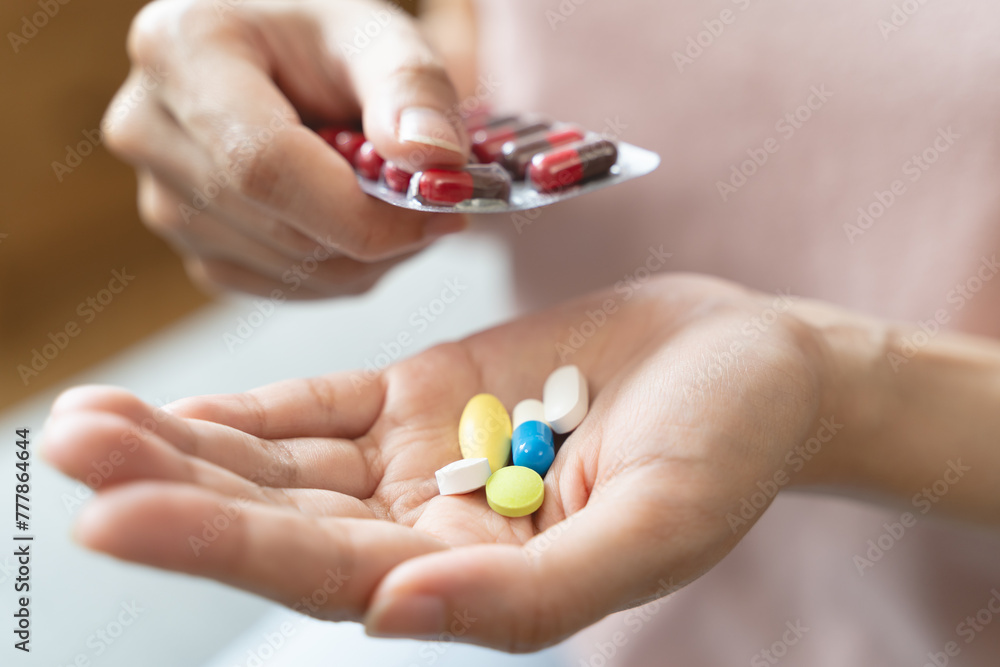 Healthcare Harmony: Close-Up Hands Holding Medication and Water Glass for Optimal Wellness, Pharmaceutical Treatment and mental health treatment