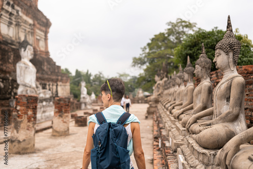 Tourist in buddhist temple at Ayutthaya. photo