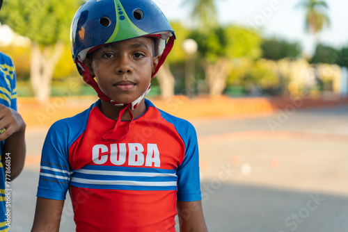 Portrait Of A Black Child With Helmet And Skating Sports Clothes.
