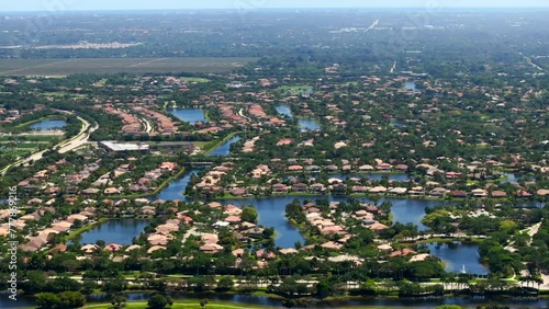 Aerial telephoto 3x zoom drone video luxury homes in Parkland Florida USA photo