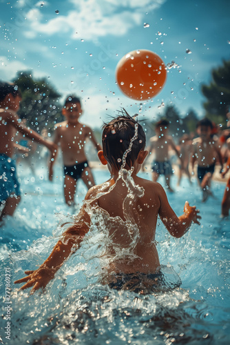 A backlit scene captures children playing with a vibrant orange ball in a sun-drenched pool, water droplets frozen in motion against a clear sky. during summer camp.