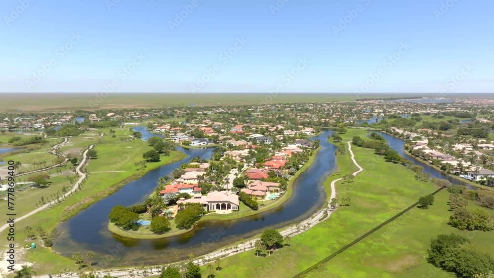 Luxury homes Heron Bay Parkland Florida upscale neighborhood mansion