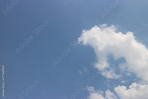 white clouds on the blue sky perfect for the background