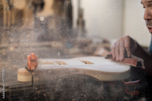 Luthier blow the wood away photo