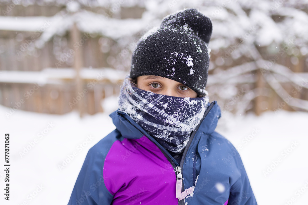 Snow Day: child in coat, scarf and hat Snow Day: child in coat, scarf and hat