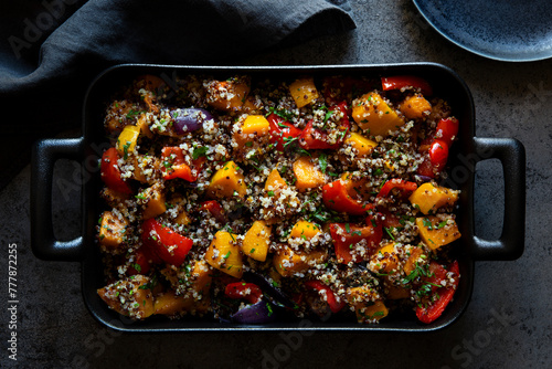 Quinoa dish with roasted vegetables, butternut squash, bell pepper photo