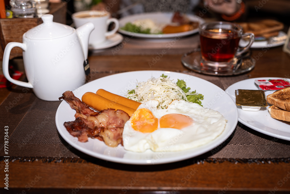 Breakfast served on the table. Breakfast served on the table.