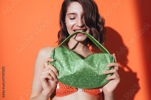 Happy woman fashion portrait with bag photo