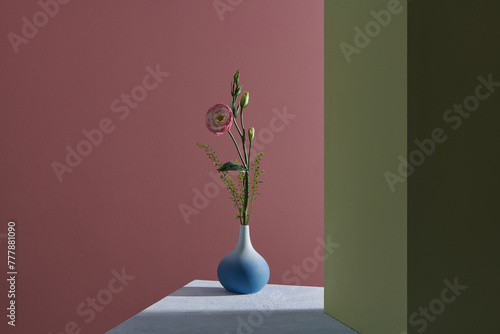 Bouquet of Lisianthus flowers in vase on a table in sunlight. Mockup.