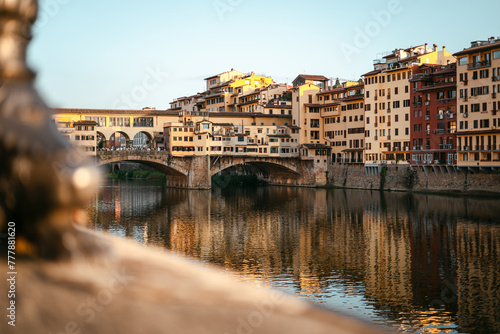 Ponte vecchio bridge in Florence during sunset photo
