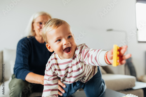 Grandma playing with her grandson  photo