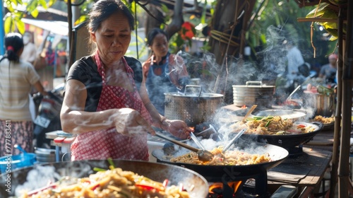 Cooking Pad Thai in an open-air kitchen