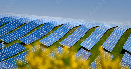 Les Mees solar park curvature on rolling hills in France photo