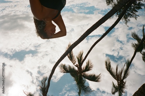 Relaxing by palm trees photo