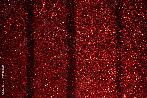 Red sequined fabric: detail of shiny cloth with shimmering effect