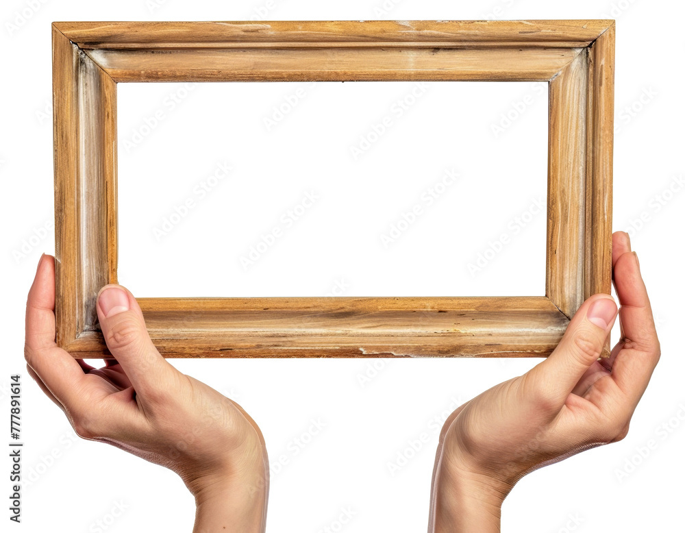 A person is holding a wooden frame, cut out - stock png. A person is holding a wooden frame, cut out - stock png.