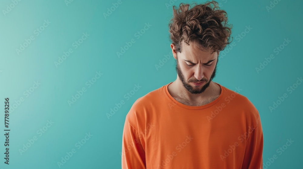Curly-Haired Man in Orange Shirt Curly-Haired Man in Orange Shirt