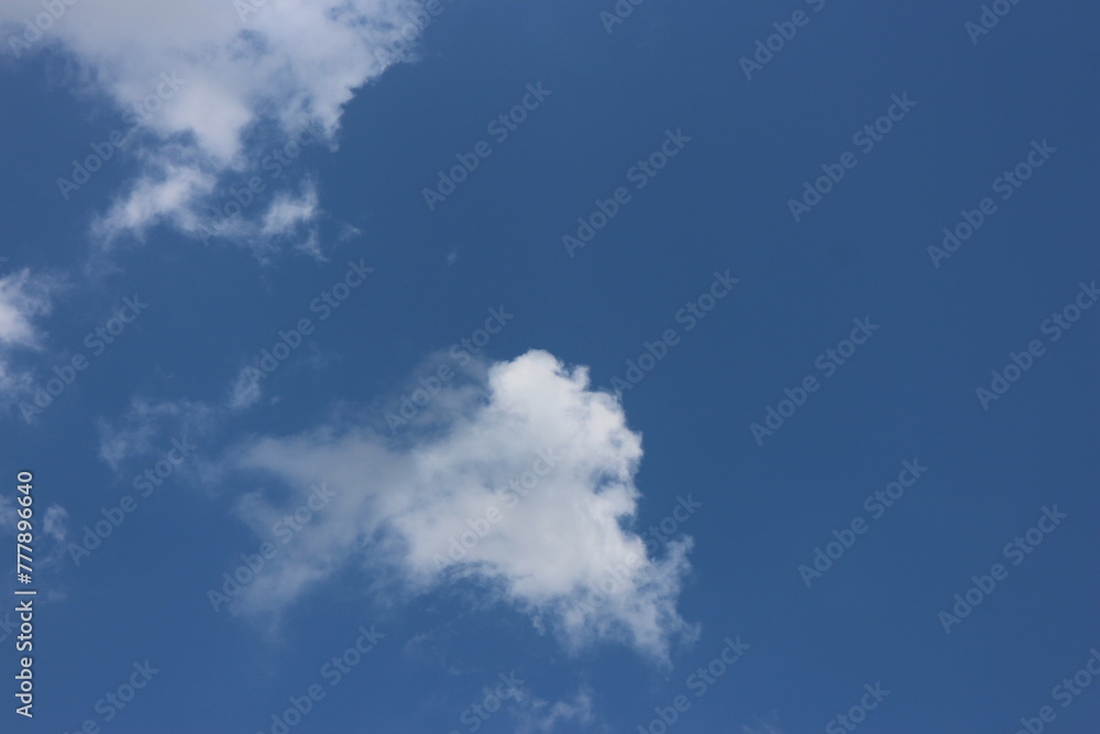 Blue sky with white cloud. Blue background. The summer sky is colorful clearing day and beautiful nature in the morning. for backdrop decorative and wallpaper design. The perfect sky background. Blue sky with white cloud. Blue background. The summer sky is colorful clearing day and beautiful nature in the morning. for backdrop decorative and wallpaper design. The perfect sky background.