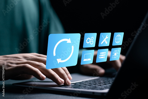 Software update or operating system upgrade concept. Businessman using laptop to installing update process, Improved functionality in the new version and improved security.