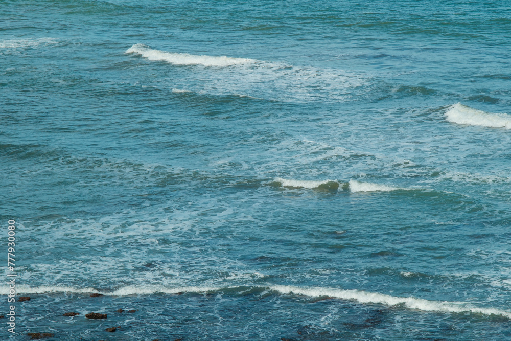 Waves and foam on the coast of the Atlantic Ocean, Argentina, Buenos Aires province, Mar Del Plata