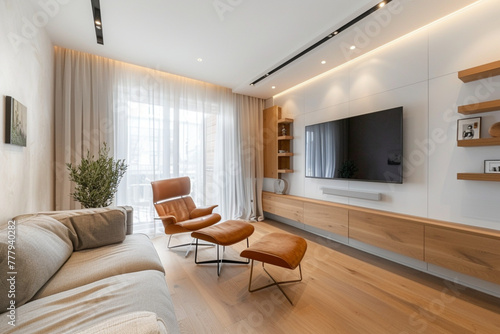 Cabinet for TV on the white wall in living room with armchair  minimal design