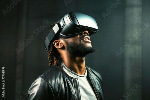 Young African American man uses virtual reality glasses