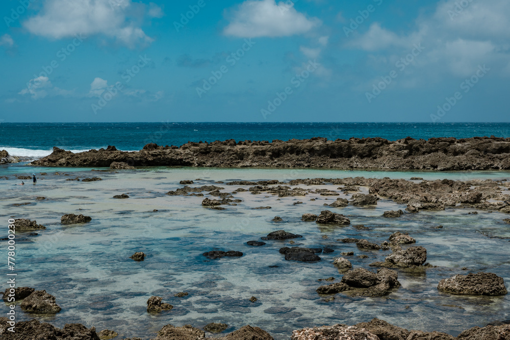 Shark’s Cove North Shore Oahu Hawaii.   reef deposits.  Snorkeling ( snorkelling ). A reef is a ridge or shoal of rock, coral or similar relatively stable material, 