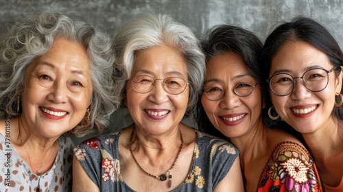 Four women are smiling and posing for a photo photo