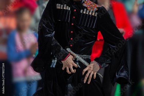 September 17, 2023. Belarus. city of Gomel. A holiday of ethnic cultures of different peoples and nationalities.A Georgian man in a national costume with a dagger. photo