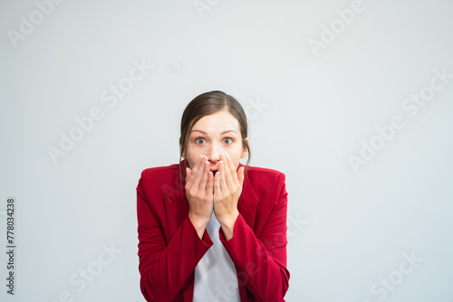 Businesswoman showing anxiety isolated over white background.