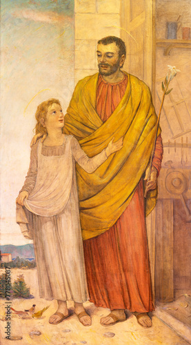 MILAN, ITALY - MARCH 8, 2024: The painting of St. Joseph in the church Chiesa di Santi Quattro Evangelisti by Giovanni Luigi Rossi (1956).