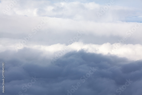Fototapeta Naklejka Na Ścianę i Meble -  Grey Clouds Over The Ocean in a Cloudy Day