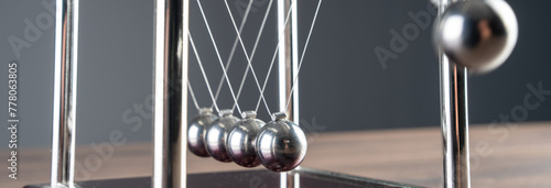 Harmony in Motion: Newton's Cradle Demonstrates the Beauty of Physics