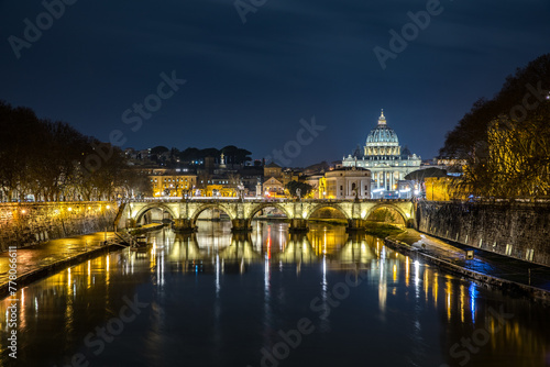 View across the Tiber to St. Peter's Basilica from the Angel Bridge in Rome Lazio Italy
