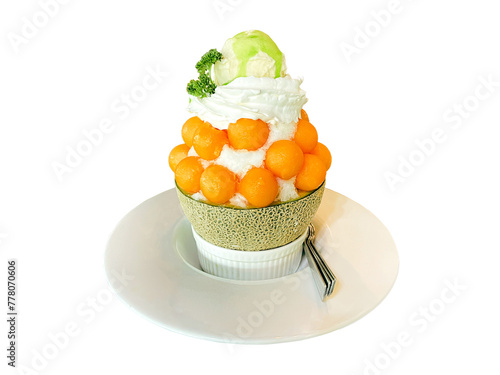 isolated Melon Shaved Ice or Bingsu on a white background is a Korean style shaved ice menu. It is popular to eat garnished with cut fruit, syrup, and sweetened condensed milk.