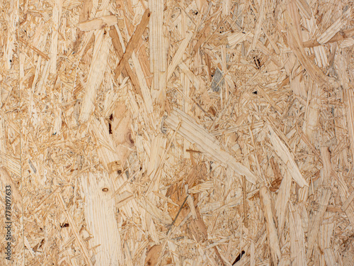 Detail of the texture and patterns of an OSB wood board photo