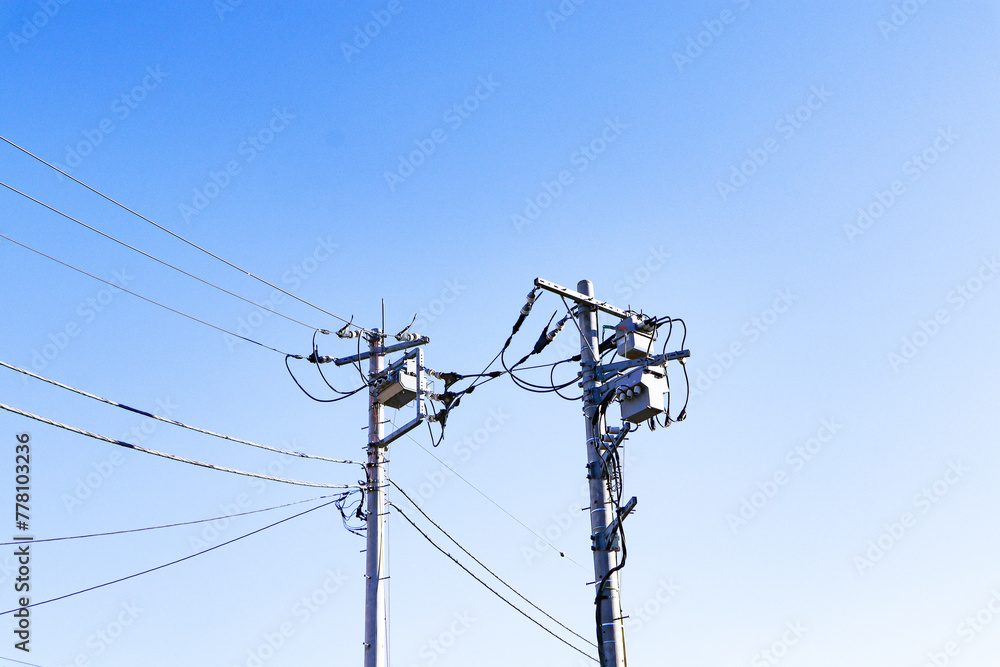 Transformers small sphere size and electric wire phone lines. Energy and technology. Electrical post on electric power. electrical device. Electrical wires connect electric poles to each other. Transformers small sphere size and electric wire phone lines. Energy and technology. Electrical post on electric power. electrical device. Electrical wires connect electric poles to each other.