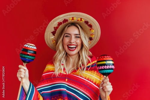 a blonde hair female with a goofy look, gripping maracas, wearing a poncho and hat infront of solid red background