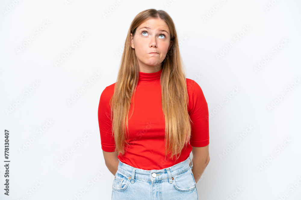 Young caucasian woman isolated on white background and looking up Young caucasian woman isolated on white background and looking up
