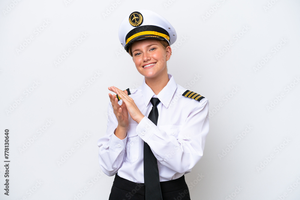 Airplane caucasian pilot woman isolated on white background applauding after presentation in a conference Airplane caucasian pilot woman isolated on white background applauding after presentation in a conference