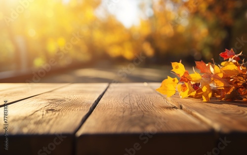 a yellow leaves on a wooden surface