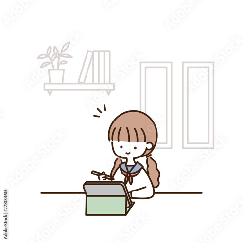 タブレットPCを使って自宅で勉強をするかわいい女子学生
